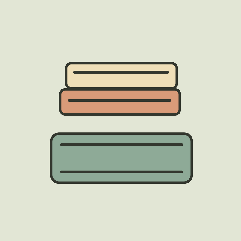 Illustration of folded cream towels above a striped sage bath mat.