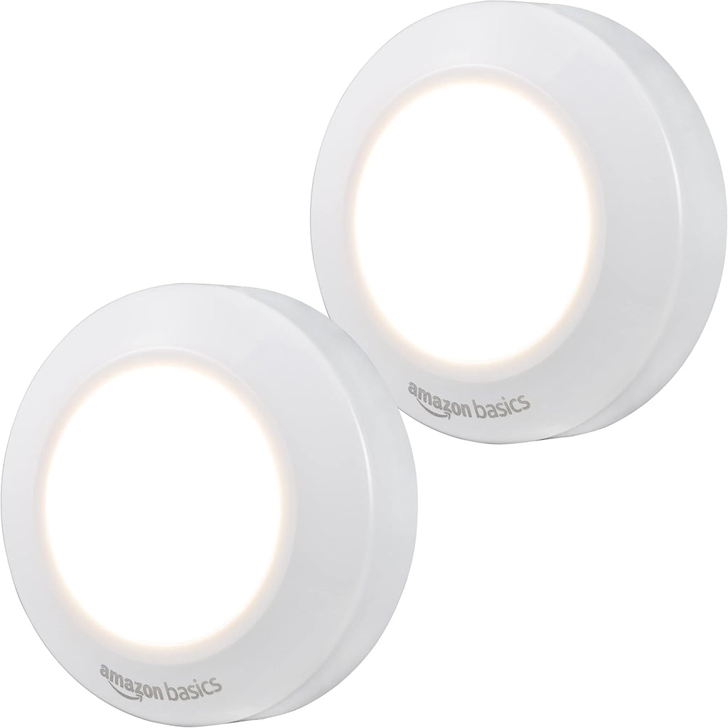 Amazon Basics LED Puck Lights, Battery Operated, 50 Lumens, Under Cabinet Lighting, Easy to Install, Easy to Use, Adhesive Backing, 2-Pack, White