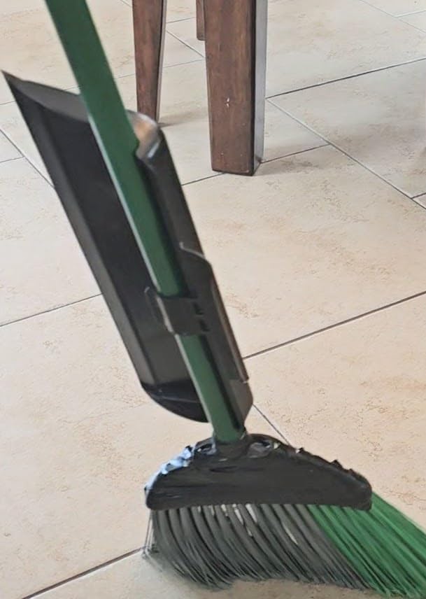The BROOM BUDDY: A A Minimalist Dustpan. Snaps on, Stays on. A Small, Convenient, Lightweight Dustpan, Designed to Ride Along While Sweeping.