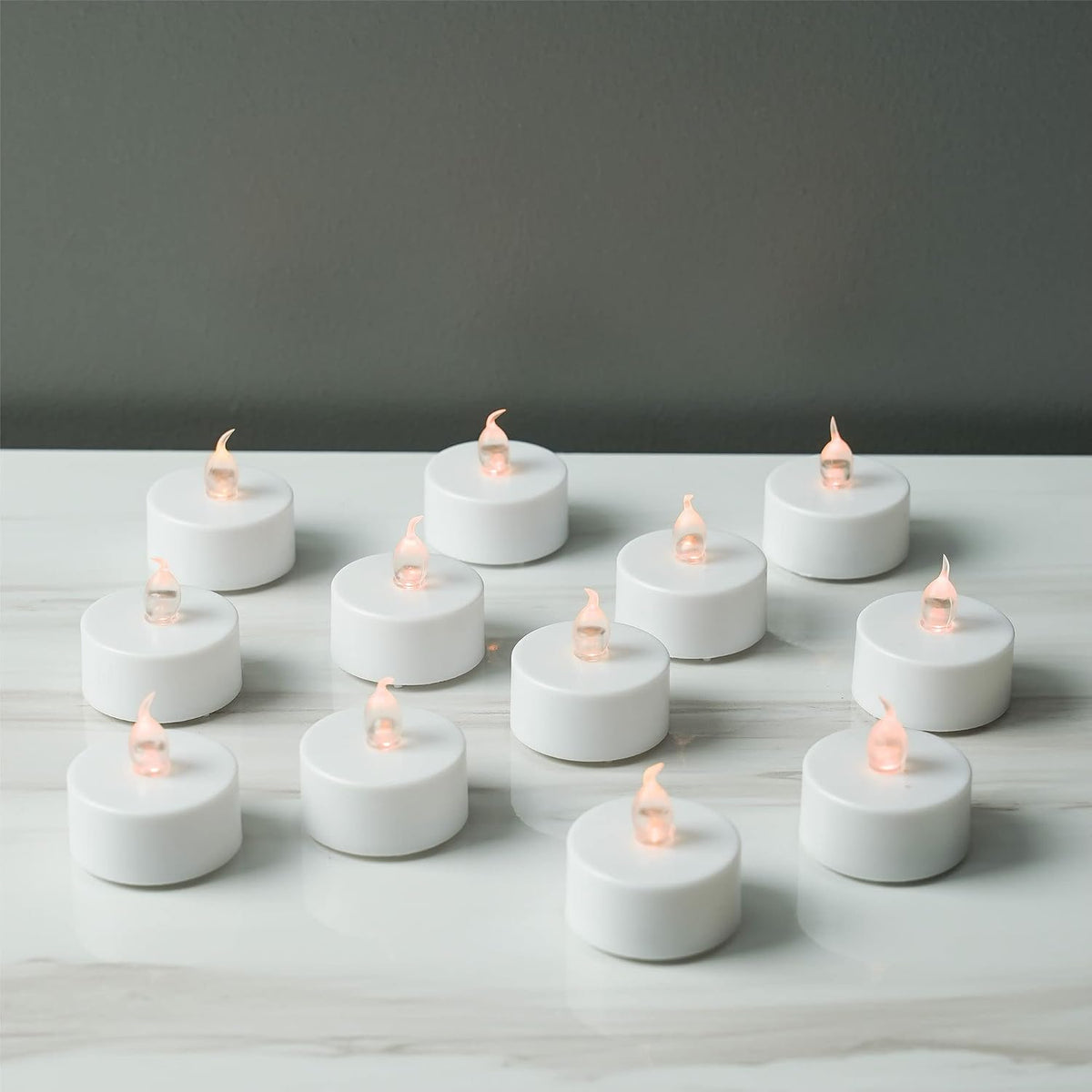 ARORA Flameless Flickering LED Tea Lights Candles Pack of 12, Warm Yellow Votive Battery-Operated Candles for Wedding Anniversary Halloween Christmas