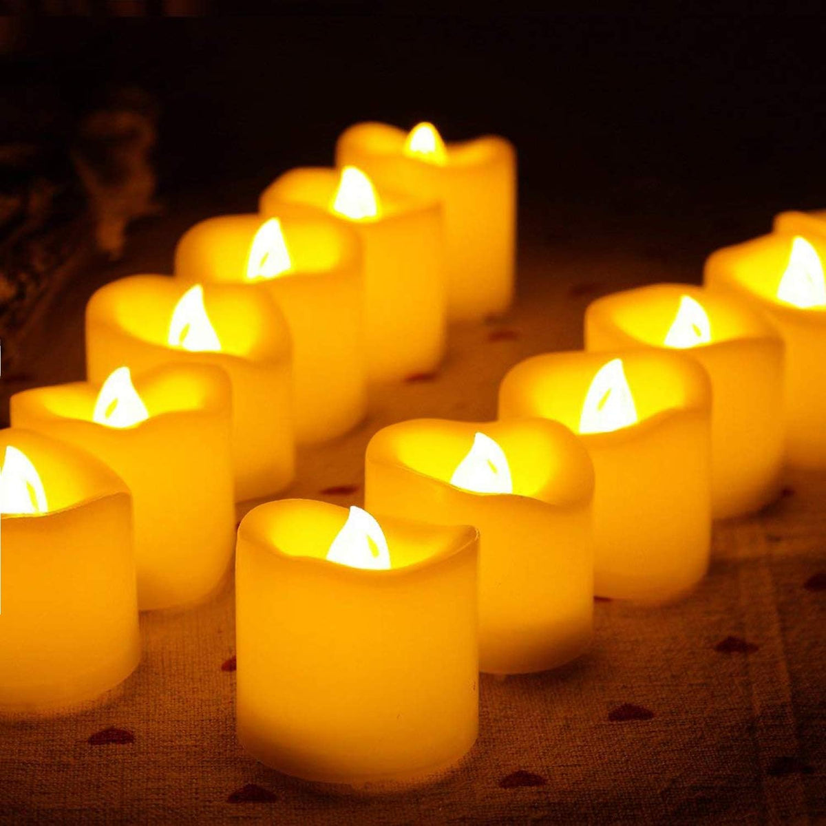 Novelty Place 24Pcs Flameless LED Candles - Warm Yellow Flickering Bright Tealights for Votive, Wedding, and Birthday, Halloween, Christmas - Battery-Powered Electric Candles