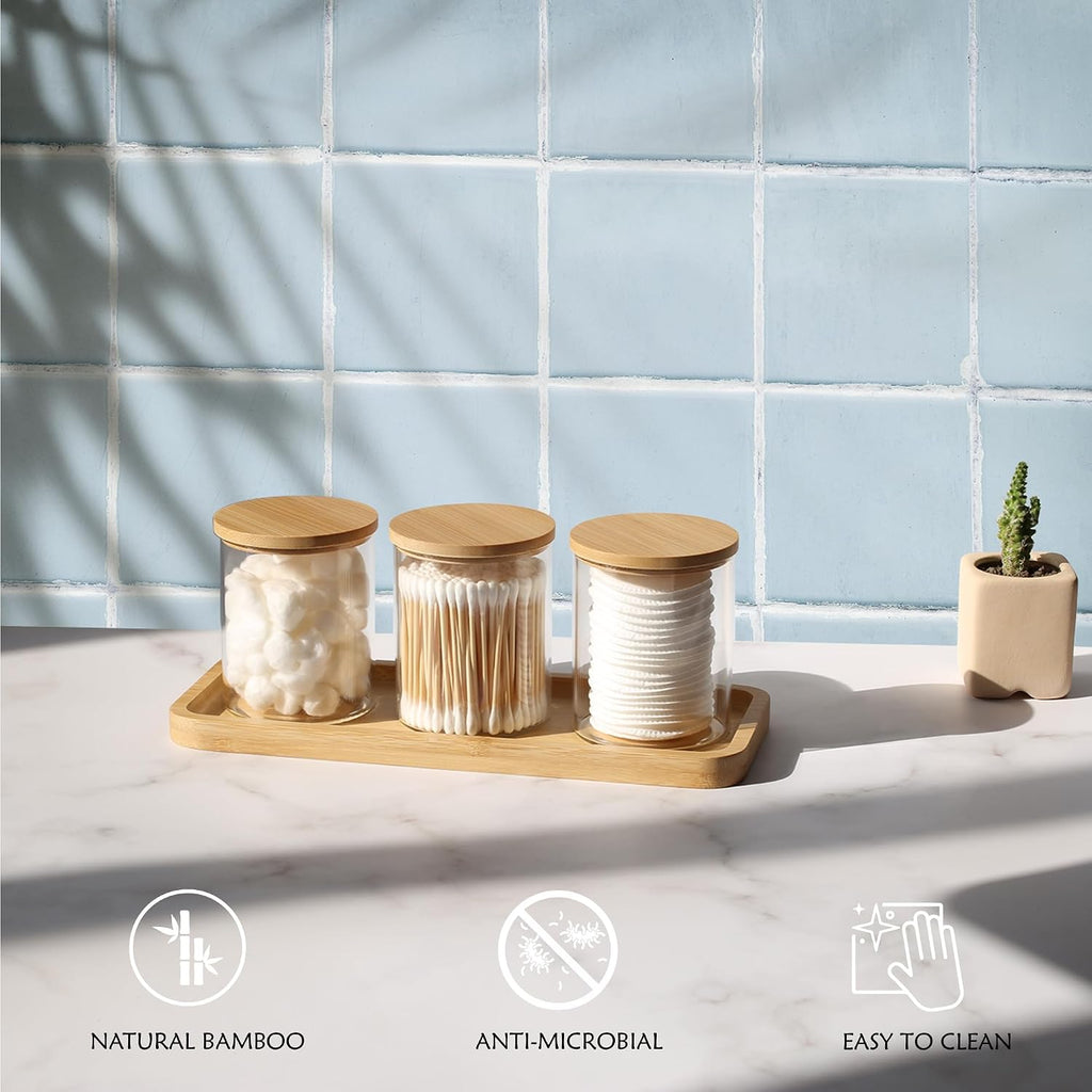 INIUNIK Qtip Holder with Vanity Tray, 3 Pack Glass Apothecary Jars with Lids, Bathroom Accessories Canisters Organizers Jars Containers for Cotton Ball Round Swab Pad Hair Ties Floss Perfume Jewelry
