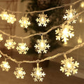 CESOF Christmas Lights, 20 Ft 40 Led Snowflake String Lights Battery Operated Fairy Lights for Bedroom Room Party Home Xmas Decor Indoor Outdoor Tree Decorations Warm White