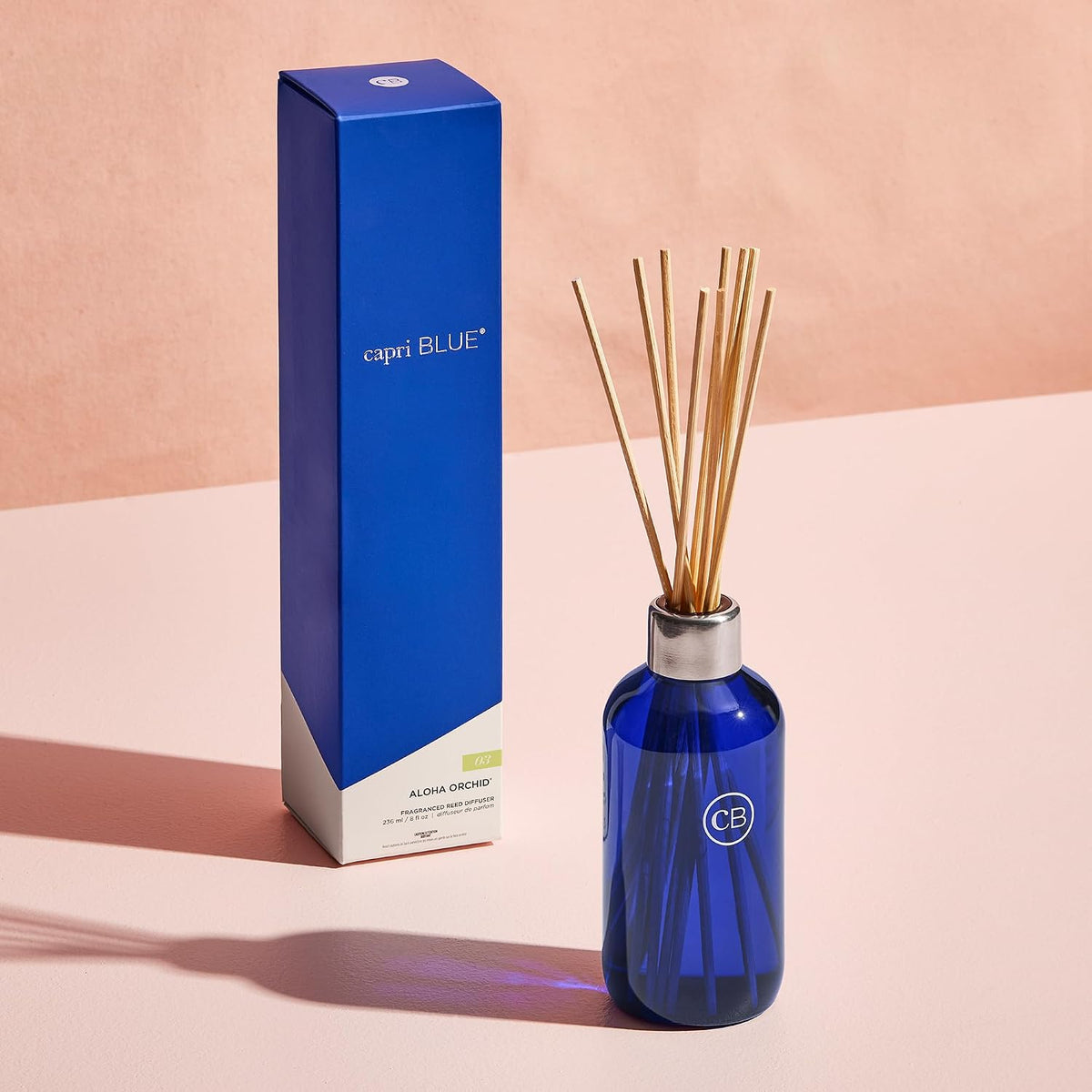 Capri Blue Aloha Orchid Reed Diffuser Set, Includes Sticks, Fragrance Oil, and Glass Bottle, Scented Room Fresheners,Cobalt Color (8 Fl Oz)