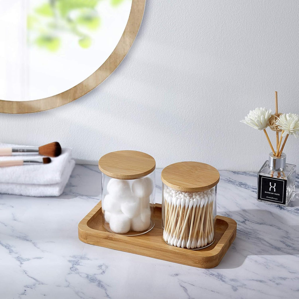 INIUNIK Glass Qtip Holder with Vanity Tray, Apothecary Jars Bathroom Accessories Bathroom Canisters Organizer Countertop Q Tip Holder for Cotton Ball Round Swab Pad Hair Ties Floss Perfume Jewelry