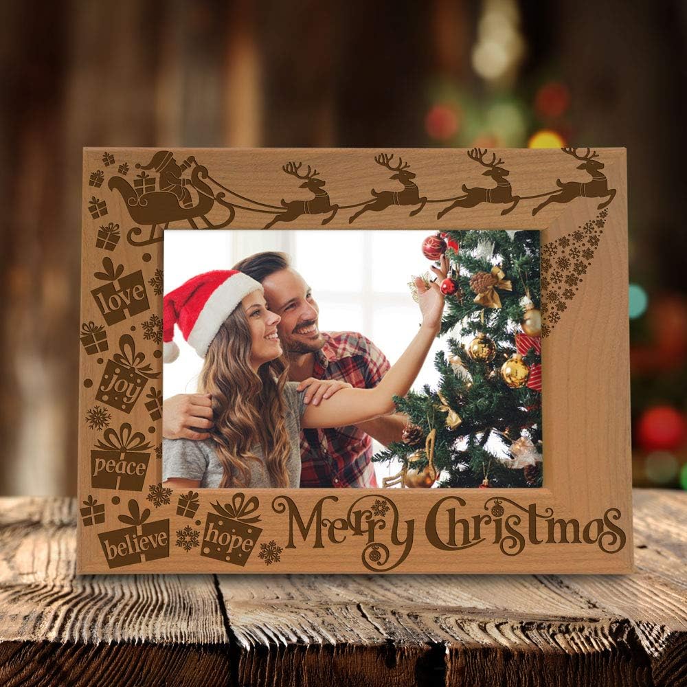KATE POSH Merry Christmas Love Peace Joy Believe Hope, The Magic of Christmas Family Picture Frame. Santa, Reindeer and Sleigh Decor. Engraved Natural Wood Photo Frame (5x7-Horizontal)