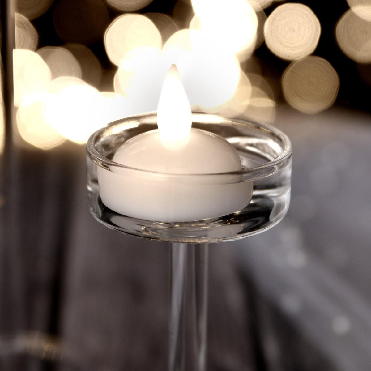 AGPtek 12 PCS Floating Candles Waterproof Tea Light Candles, Battery Operated Flameless Floating Candles for Centerpieces Wedding Party Decoration - Warm White (Pack of 2)