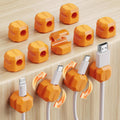 12 Pack Rotatable Cable Clips,Spring Cord Organizer Desk Cable Management Cord Holder Adhesive Phone Charger Cord Clips for Home Office Car Wall Nightstand Accessories Orange