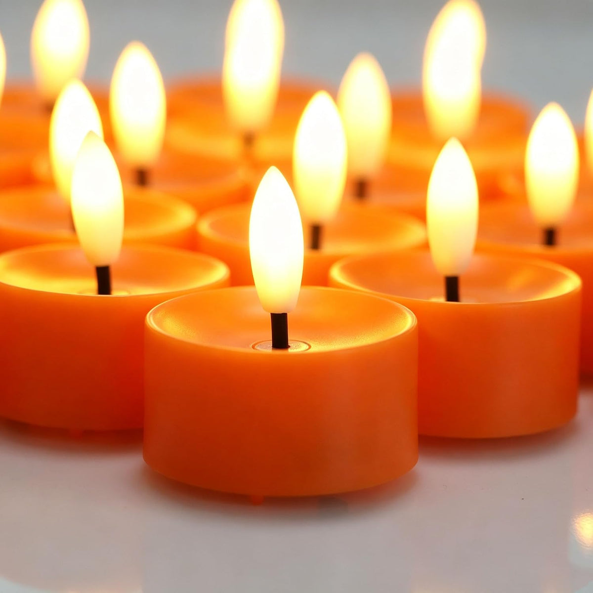 QIDEA Halloween Orange LED Tea Lights for Pumpkin Christmas Decor 12 Sets