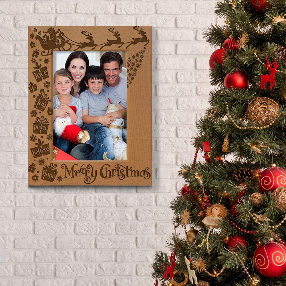 KATE POSH Merry Christmas Love Peace Joy Believe Hope, The Magic of Christmas Family Picture Frame. Santa, Reindeer and Sleigh Decor. Engraved Natural Wood Photo Frame (5x7-Vertical)