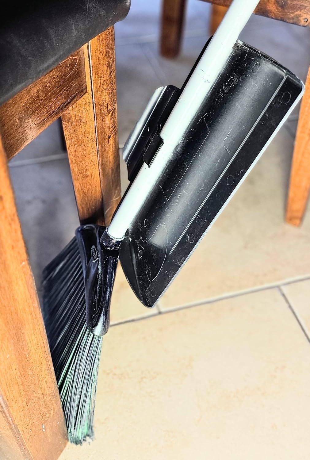 The BROOM BUDDY: A A Minimalist Dustpan. Snaps on, Stays on. A Small, Convenient, Lightweight Dustpan, Designed to Ride Along While Sweeping.
