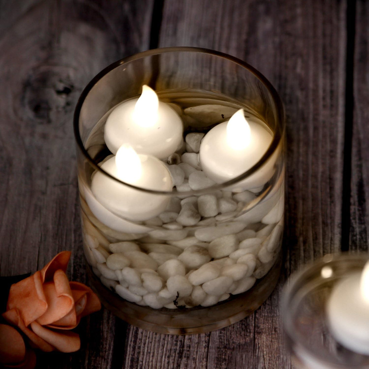 AGPtek 12 PCS Floating Candles Waterproof Tea Light Candles, Battery Operated Flameless Floating Candles for Centerpieces Wedding Party Decoration - Warm White (Pack of 2)