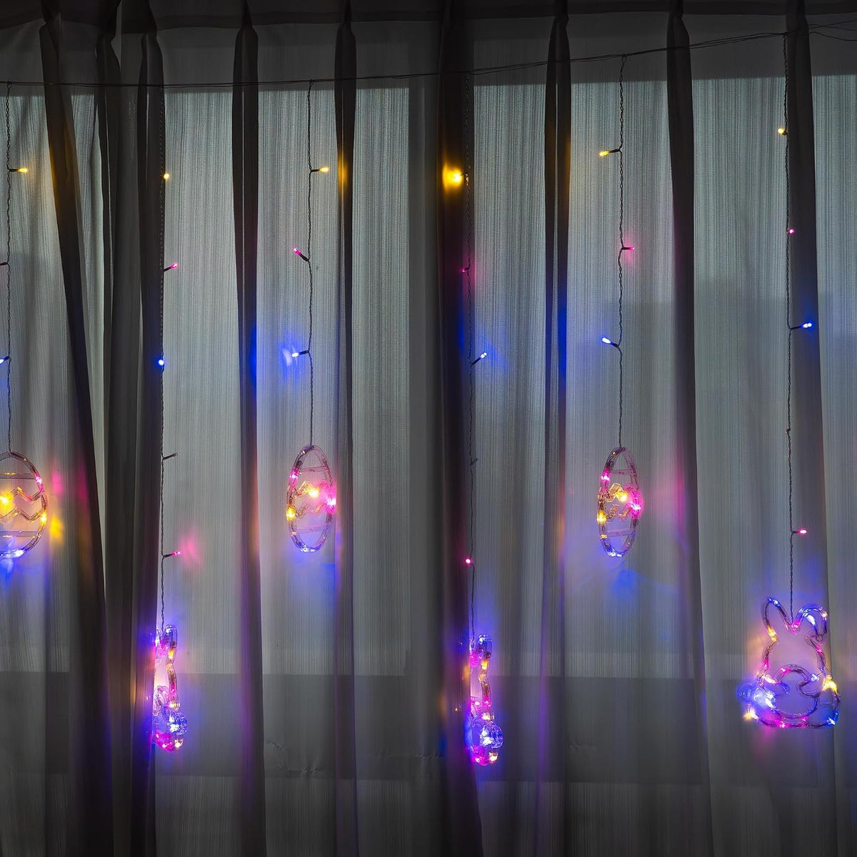 Dazzle Bright Easter Lights, 222LED 9FT Pastel Rabbit and Eggs Curtain String Lights with 8 Modes, Plug in Easter Decorations for Indoor Window Outdoor Party Decor (Multi-Colored)