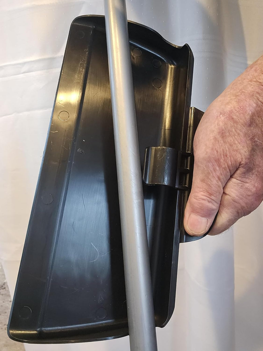 The BROOM BUDDY: A A Minimalist Dustpan. Snaps on, Stays on. A Small, Convenient, Lightweight Dustpan, Designed to Ride Along While Sweeping.